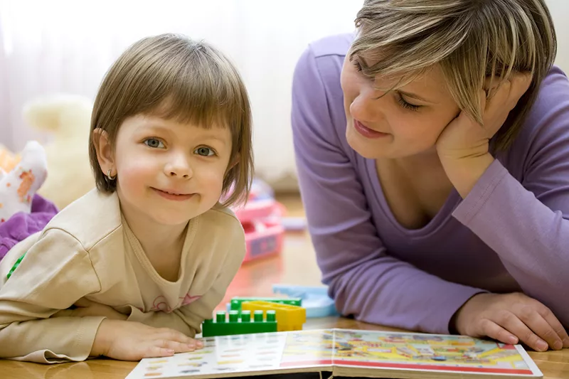 child with teacher